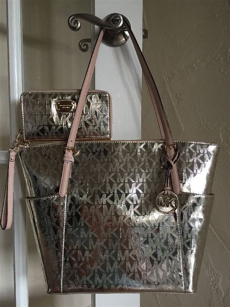 michael kors pale gold mirror|Micheal kors signature mirror metallic tote .